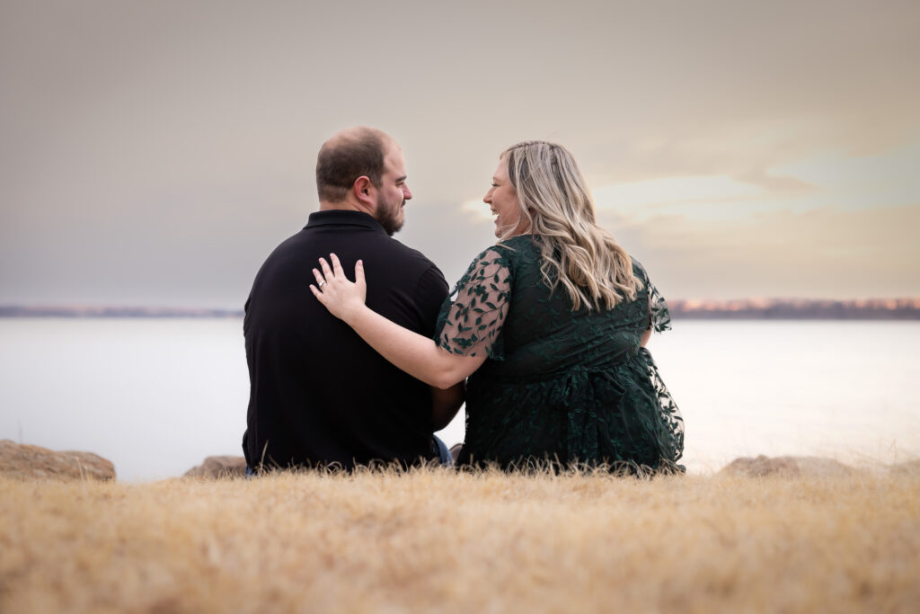 couple watching a lake sunset