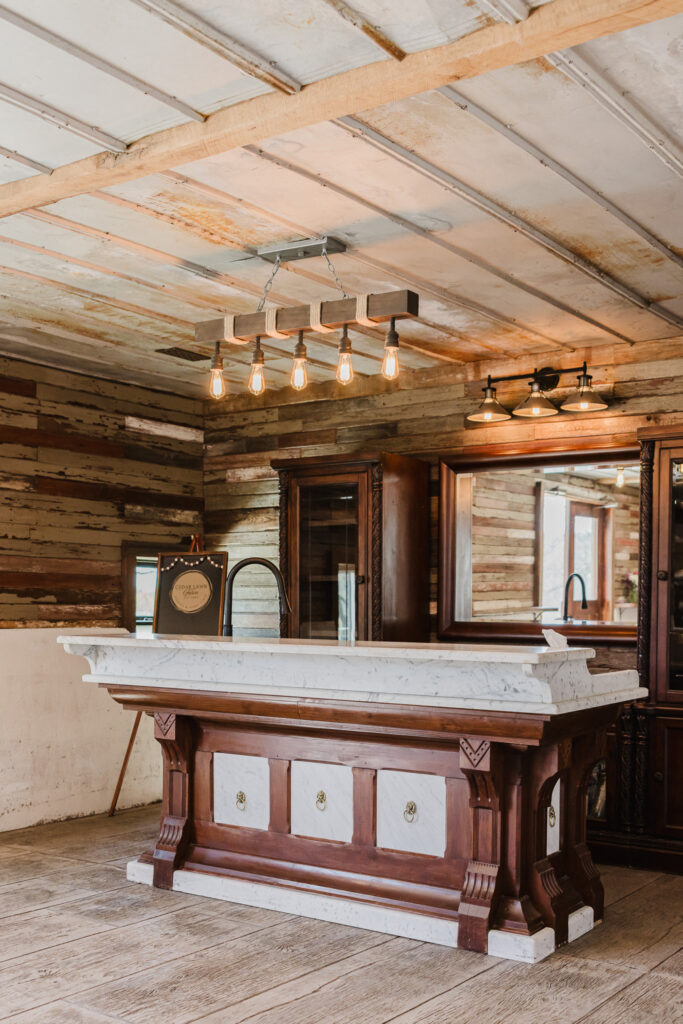 Bar inside a wedding venue in Topeka Kansas with lighting and mirror
