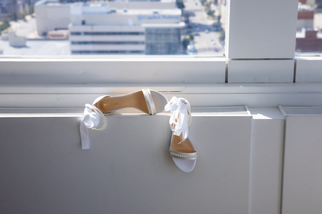 Bridal shoes with Topeka Skyline in the background